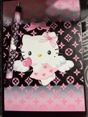 Pink & Black Hello Kitty journal with Matching Pen.